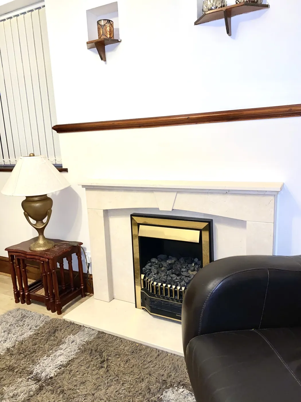 Fireplace and lounge in the Family Apartment
